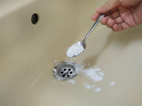 Baking soda and vinegar to unclog sink. This simple unclogging method can be used on most types of clogs. Begin by pouring one cup of baking soda down the drain, followed by one cup of vinegar. The mixture will fizz and bubble as it works to break down the clog. After fifteen minutes, flush the drain with hot water. Vinegar and baking soda are effective and safe ways to clean your ... 