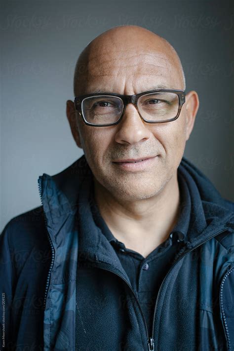 Bald guy with glasses. Learn how bald men with glasses can look attractive and charismatic. See 10 examples of famous bald celebrities who wear glasses, such as Stanley Tucci, Steve Jobs, and Samuel L. Jackson. 