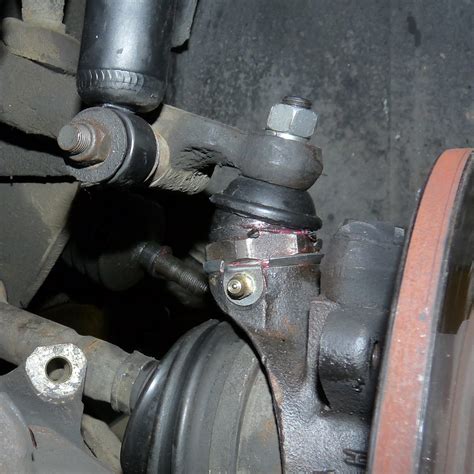 Ball joint replacement. Install the snap ring onto the ball joint and reinstall it into the arm. Bolt the new arm, or the old arm with new ball joint, in place. Figure 5. Remove the upper mounting bolts. Figure 6. Unbolt the upper control arm. If not changing the lower ball joint, skip to Step 7. Step 6 – Replace the lower ball joint 