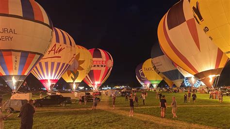 The night glow wowed crowds on Thursday evening despite the fiesta's first flight being called off due to wind conditions. Video Journalist: Alex Howick. Follow BBC West on Facebook, Twitter and .... 