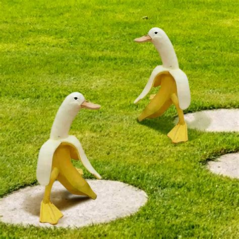 Banana duck sculpture. 1. Our unique banana duck will add a warm feeling to your house, porch, or garden decoration. 2. Lively and lovely design, high-quality resin material, sturdy and durable, good weather resistance, and durable. 3. This cute banana duck adds an artistic touch to your outdoor space. Decorate your personal garden with cute banana duck sculptures! 4. 