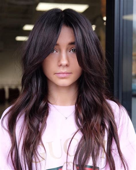 An asymmetrical bob is right in trend for 2022. Try adding a warm black color with bangs for a sleek finish. 27. Mocha Ash with Curtain Bangs for Long Length Hair. Source. Mocha ash hair color is perfect for those summer months. In the photo above they kept her hair a long length and added the cutest bangs. 28.. 