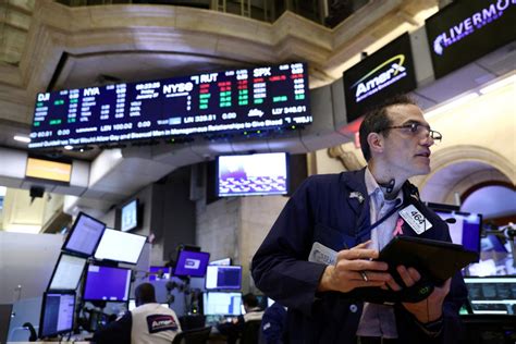 Bank stocks plunge at the open on Wall Street following failures of two banks; investors seeking safety rush into bonds