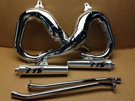 Banshee toomey pipes.  K&N air filter with lid , toomey carb needles . ...