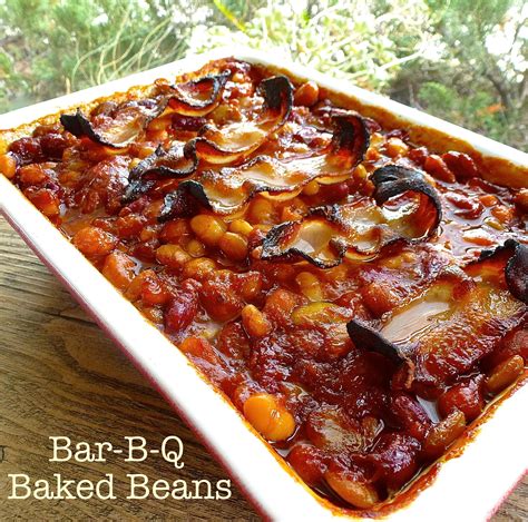 Bar bq baked beans. To the beans add the cooked onion and bacon, and the remaining ingredients. Stir to combine. Pour the bean mixture into a very large baking dish, or two 9 x 13 foil baking pans. Place the pans on the center rack of the oven and bake for 1 -1/2 hours. Cool the beans slightly before serving. 