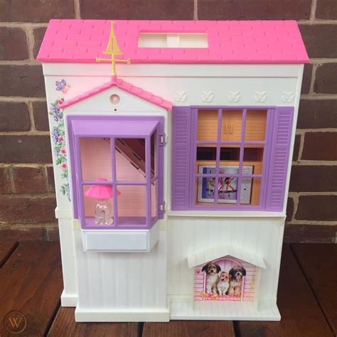 Barbie folding dollhouse. Vtg 1998 MATTEL Barbie 'Happy Family' Grandma's Kitchen Foldable PLAY SET - K09. £9.99. 1 bid. £3.50 postage. Ending Sunday at 9:26PM BST 2d 12h. Barbie Malibu House Playset (FXG57) ... Barbie DreamHouse Dollhouse with 70+ Accessories, Working Elevator & Slide, Tran. £389.46. Free postage. 