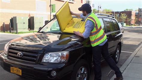 245 254K views 6 years ago It doesn't get much more conspicuous than a new parking regulation enforcement tool that uses suction cups covered in bright yellow plastic to render your car.... 