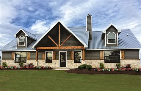 The exterior of this one-story Barndominium-style house pla