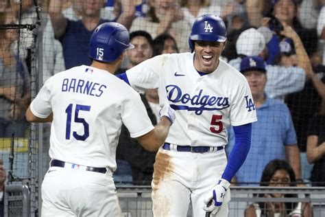 Barnes homers for first time in nearly a year, Dodgers beat Brewers 1-0 for 11th straight victory