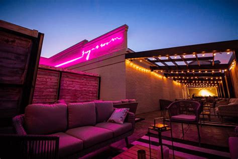 Bars in houston. Classic with a refined twist. Sunset Rooftop Lounge is everything from your neighborhood local bar, day time patio to your elevated nightlife. Listen to live music and have a cold local beer or grab a signature cocktail curated by our team members and watch the skyline while the sun sets. Open 7 days a week to ensure you have a fabulous time ... 