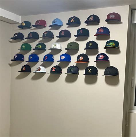 Baseball hat rack for wall. Lrgkcne Adhesive Hat Rack for Wall Baseball Caps, 16 Pack Hooks for Hats, Strong Hold hat Wall Organizer, Minimalist hat Display Rack, No Drilling Hat Racks for Door,Bedroom,Closet Black. 4.6 out of 5 stars 253. 1K+ bought in past month. Limited time deal. $14.39 $ 14. 39. Typical: $15.99 $15.99. 