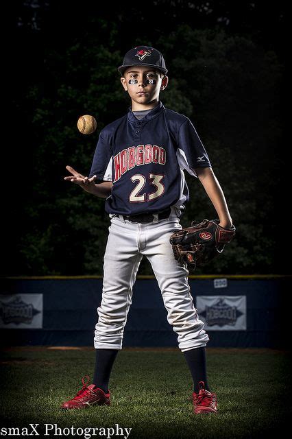May 18, 2023 - Young male baseball player pose