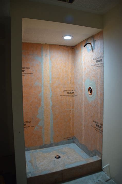 Basement shower. Cassity showed you a bit about the basement bathroom before just this morning. Sorry that we forgot to get before pictures- I am sure we will find them a year from now! Anywho, now that all the walls are framed in the bathroom and everything behind the walls are in place, I am going to show you how I installed … 