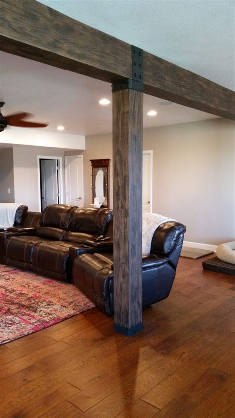 Basement support beams. Step 1: Start in the Basement: Unfinished basements can make it easier to see where the weight in the house is resting. Look for a metal I-beam or multi-board wood beam. Walls that sit directly on top of these beams are usually load bearing. 