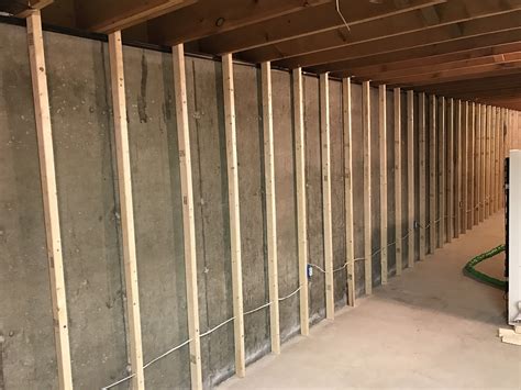 Basement wall insulation. So I decided to add 4 inches of rigid foam insulation to the exterior of the wall for an insulation rating of about R24. First I dug down about 8 to 12 inches ... 