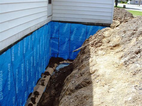 Basement waterproofing membrane. House foundation waterproofing. 