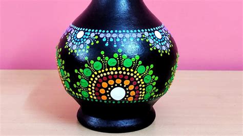 Basic dot mandala painting on a ceramic pot. Dot painting for …