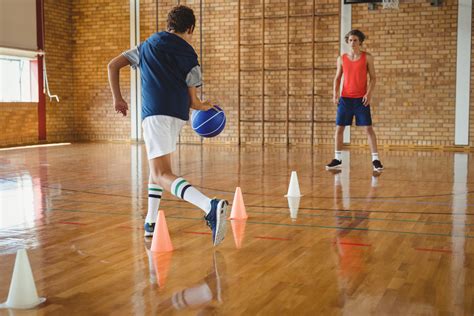 Here's what to teach, ordered by priority: Lay ups - You should practice lots of lay ups with both hands. Your goal should be to get all players to make lay ups with their left and right hands equally well!! Teach them to jump off the proper foot. They should jump off the left leg when shooting a right hand lay up.. 