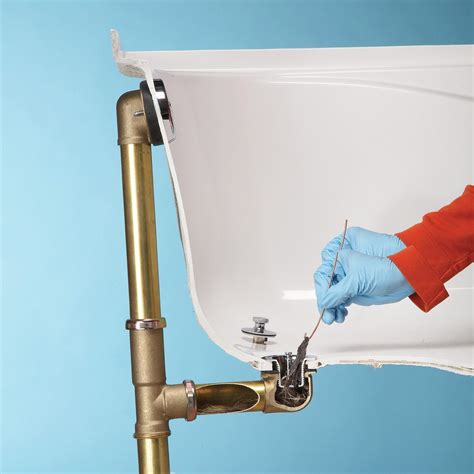 Bath tub repair. The first step for removing rust from a bathtub is to sand down any excess. Landmark Home Warranty recommends using fine sandpaper or a steel brush to create a smoother surface. You want this surface to be as flat as possible to allow the epoxy to form a watertight and airtight seal over the area. If the rusted area has also left a stain on the ... 