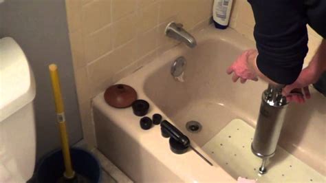 Bathroom tub clogged. In this video, This Old House plumbing and heating expert Richard Trethewey shows us every common household drain, and how to unclog them like a pro.SUBSCRIB... 