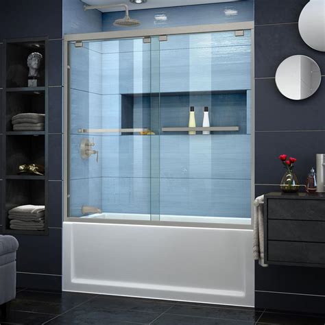 Bathtub glass door. Bypass panels - both panels will slide in the enclosure. Contemporary rounded header. Dual through-the-glass towel bars allow for a towel bar in the interior of the shower and the exterior. Standard width ranges fit openings from 44 to 58.5-inches. Standard return panel width up to 60-inches. Standard height options are 57 or 65.5-inches tall. 