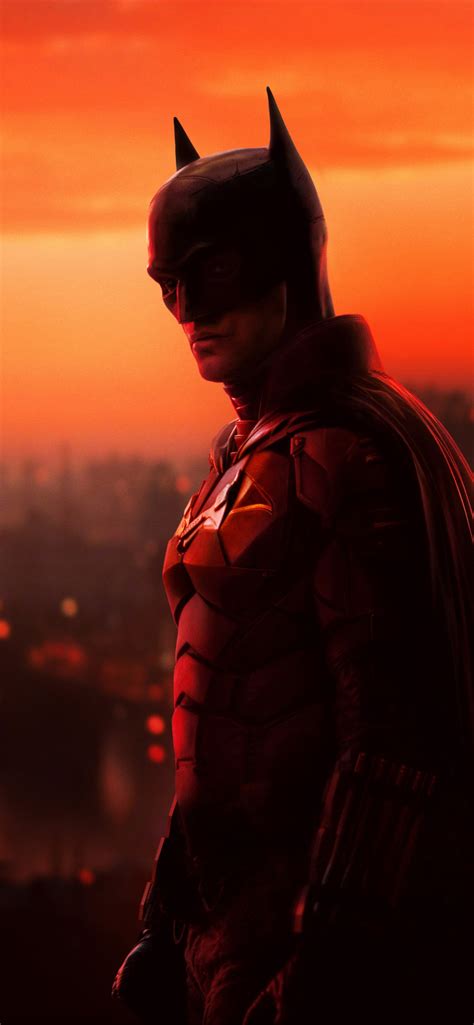 Batman 2022 iphone wallpaper. A breathtaking wallpaper of Batman and Catwoman on a seemingly a rooftop from the 2022 DC film "The Batman". Multiple sizes available for all screen sizes and devices. 100% Free and No Sign-Up Required. 