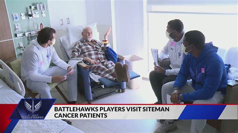 Battlehawks players visit cancer center patients