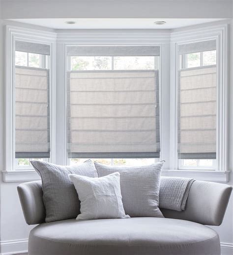 Bay window blinds. Roller shades have a smoother appearance and can be operated by pulling down on the shade or with a pull chain. Our selection of natural shades are made from bamboo or kea, adding a subtle earthy appeal to any room. If you prefer blinds over shades, we offer several different options. Wood blinds will add a natural warmth to your window. 