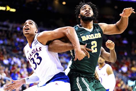 So far in the second half, Kansas has out-scored Baylor 27-9. The Jayhawks are shooting better than 60% from the field, while the Bears are under 40%. And Bill Self and the Kansas bench are thrilled. Kansas leads 50-49 against Baylor with 14:28 left in 2nd half. With a Gradey Dick 3-pointer, Kansas has now taken the lead back from Baylor.