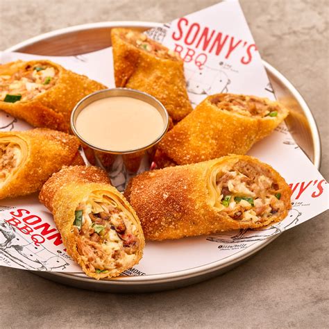 slathered in your favorite BBQ sauce. 13.49 | 760-890 Cal BBQ pORk eGg ROlLs Loaded with Pulled Pork, homemade coleslaw and Pepper Jack cheese with a side of Smokin' Ranch dip. 9.29 | 930 Cal sOnnY's CUBan™ Our slow-smoked Pork, pulled and sliced with Swiss cheese, pickles and our Mustard BBQ Sauce on toasted garlic bread. 9.99 | 1140 Cal