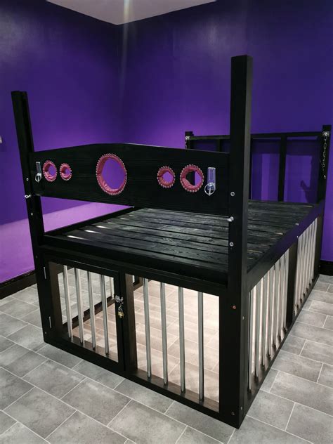 Bdsm bed frame. The Best Bed Frame for BDSM: Dore Alley Dungeon Bed. Dore Alley Dungeon Bed. $3,395. Stockroom. In the market for a new bed frame? This one is fantastic for a variety of sex positions and kink ... 
