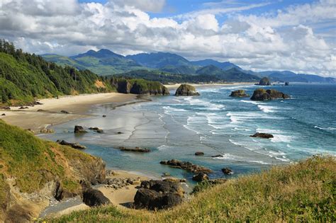 Beach in oregon. Imagine yourself sitting on a sandy beach, with the gentle sound of waves crashing in the background as you type away on your laptop. This may sound like a dream vacation, but for ... 