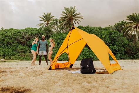 Beat the Summer Heat in Style with Our Compact Beach Tent