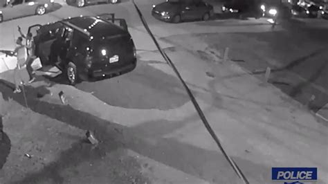 Charlotte-Mecklenburg Police released new surveillance video Friday of a block party shooting on Beatties Ford Road in June that killed four people and injur.... 