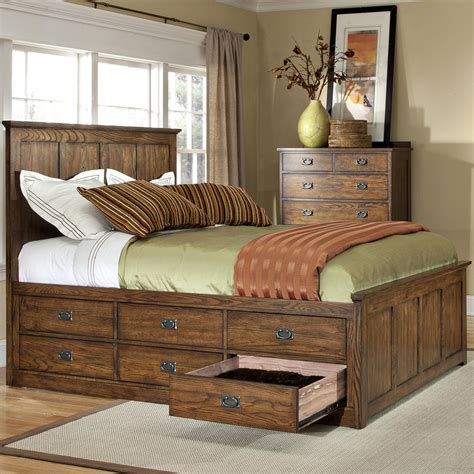 Bed and drawers. These versatile under-bed storage drawers add functional storage space under any bed. Each drawer, in this set of two, has wheels for easy access. At a height of 9 3/8" H, these drawers will fit under most bed frames. Constructed from wood these drawers are durable and stylish. Multiple finishes will match any current room decor. 