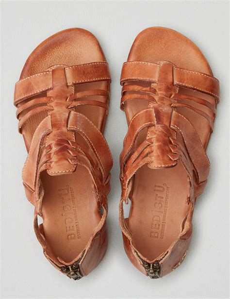 Yoli. Yoli is a slip-on leather thong sandal with an open back and an Aztec inspired woven leather upper. A super cushioned insole makes wearing Yoli comfortable all day long, and a fun pop of color on the inside makes for a unique look. Spend the warm months in this easy breezy thong, Yoli is a sandal everyone can wear and needs for ease.
