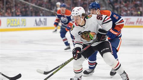 Bedard scores but McDavid has 2 assists as Oilers top Blackhawks 4-1 for 8th straight victory