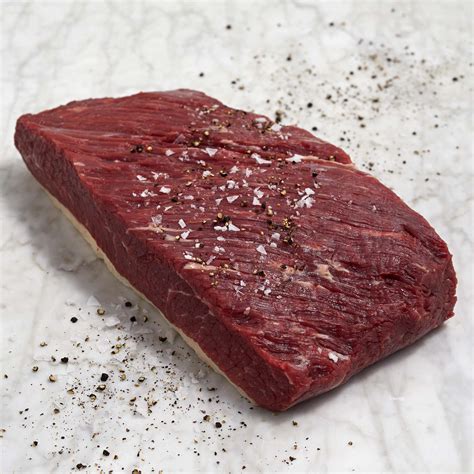Beef brisket flat. Butchers typically sell two types of brisket: flat cut and point cut. These two pieces together make up a full brisket, a large slab of muscle from the cow’s chest. The point cut has more marbling, … 