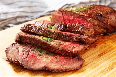 Beef london broil. Add sesame oil to a large skillet heat on medium heat and add broccoli and a bit of water to cook for until broccoli turns bright green. Transfer to a bowl . Add more oil and turn the heat up to on the skillet. Add beef strips in a single layer and cook quickly for approximately 2 minutes on each side. 