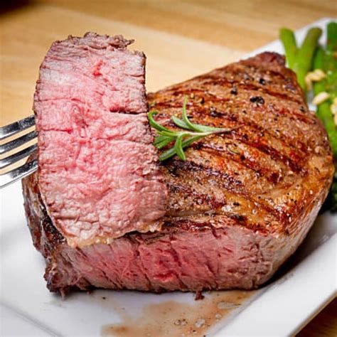 Beef round eye steak. 1. In a large bowl, whisk together all the ingredients except the steak. 2. Add the steak and let it marinate in the refrigerator for at least 30 minutes. 3. Preheat a grill to medium-high heat. 4. Grill the steak for 4-5 minutes per side for medium-rare. 