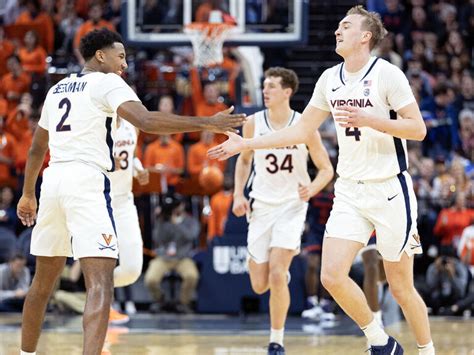 Beekman scores 17 and Virginia eases past shorthanded Morgan State 79-44