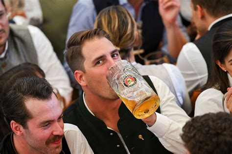 Beer flows and crowds descend on Munich for the official start of Oktoberfest