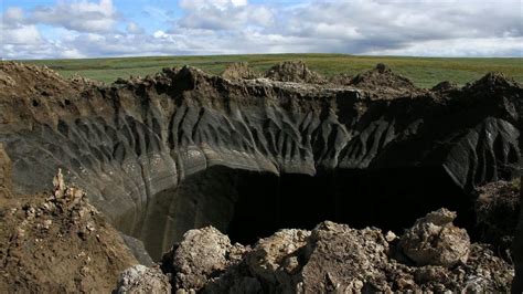 Behind the mysterious holes in Siberia - YouTube