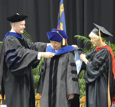 Being hooded at graduation. Things To Know About Being hooded at graduation. 
