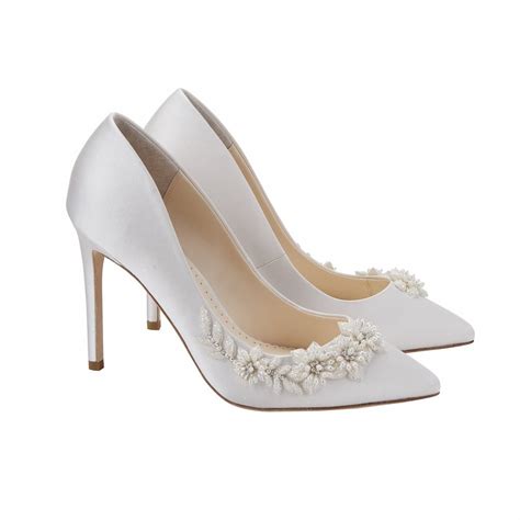 Bella belle shoes. Embellished Illusion Mesh Crystal Wedding Shoes. $409.00 $306.75 USD. or 4 interest-free installments of $76.69 by ⓘ. Size chart. Size. Color — Ivory. Ivory. Choose Size Above. Chat with a Shoe Expert. 