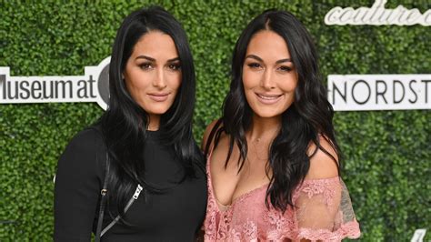 Bella sisters. The Bella Twins, Nikki and Brie, announced today they would begin going professionally by their real names: Nikki and Brie Garcia. The name changes comes as the wrestlers part ways with the WWE ... 