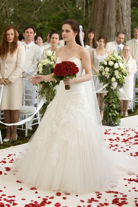 Bella twilight wedding dress. Mar 5, 2024 ... Alice (Ashley Greene) is helping Bella (Kristen Stewart) with the wedding planning and her look, but it seems like Bella isn't really ... 