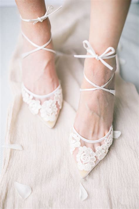 Belle belle shoes. Kitten Heel Crystal Trim Flower Organza Wedding Shoes. $395.00 USD. Discover. VANESSA. Blue Floral 2 Inch Block Heel. $289.00 USD. Discover. BROOKE. Ivory Mule Wedding Shoes with Pearl Trimmed Bows. 