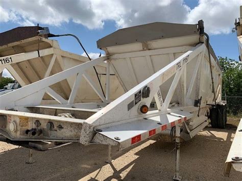 Trailer Sales LLC. Woodland, Washington 98674. Phone: (360) 686-6145. View Details. Email Seller Video Chat. SmithCo Side Dump Quad Axle Model SX4-4936 36' Tub AR400 1/4" Steel Round Bottom 48'6" Overall Length 2" Kingpin with 18" setting 24 Cubic Yard / Waterfull and 32 Cubic Yard / Heaped Two Sp...