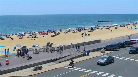 New Jersey Surf Videos. View the Long Branch, New Jersey Beach Cam and Surf Report for real-time wave conditions, tides, water temp, storm coverage and weather.